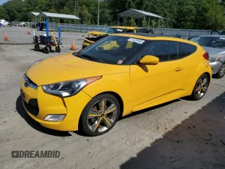 2016 Hyundai Veloster z VIN KMHTC6ADXGU265581, wystawiony jako Copart lot #57428485 z przebiegiem 125 612 mil mil oraz Tytuł czysty. Historia ofert i sprzedaży dostępna na DreamBid. Obrazek 1.