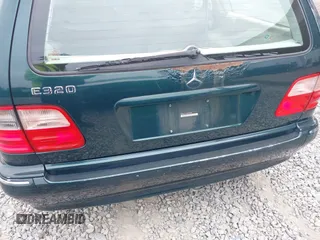 2002 Mercedes-Benz E-Class with VIN WDBJH65J12B462834, listed as a IAAI auction lot 42086848 with 190,720 mi miles. Bid and sale history available at carsss.com. Image 6.