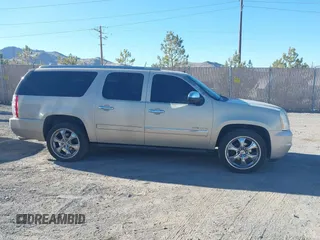2010 GMC Yukon XL Denali with VIN 1GKUKMEF9AR193007, listed as a IAAI auction lot 41699599 with 201,440 mi miles. Bid and sale history available at carsss.com. Image 13.