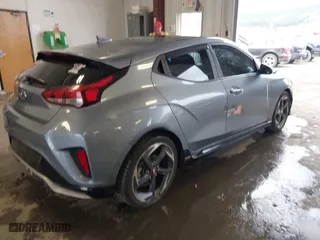 2020 Hyundai Veloster Turbo with VIN KMHTH6AB6LU029925, listed as a IAAI auction lot 41885736 with 60,625 mi miles. Bid and sale history available at carsss.com. Image 4.