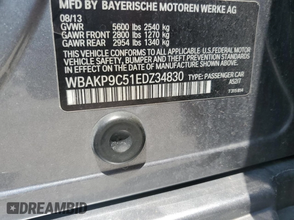 2014 BMW 5 Series 550i xDrive with VIN WBAKP9C51EDZ34830, listed as a Copart auction lot 59906435 with 123,709 mi miles and Salvage title. Bid and sale history available at DreamBid. Image 12.