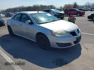 2009 Pontiac G6 1SB z VIN 1G2ZJ57B094263057, wystawiony jako IAAI lot #42092436 z przebiegiem 170 212 mil mil oraz . Historia ofert i sprzedaży dostępna na DreamBid. Obrazek 1.