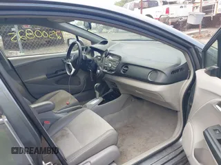 2012 Honda Insight EX z VIN JHMZE2H71CS002076, wystawiony jako IAAI lot #42500825 z przebiegiem 138 266 mil mil oraz . Historia ofert i sprzedaży dostępna na DreamBid. Obrazek 5.