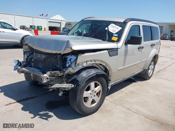 2009 Dodge Nitro SE with VIN 1D8GT28K99W513413, listed as a IAAI auction lot 39462494 with 196,456 mi miles. Bid and sale history available at carsss.com. Image 2.