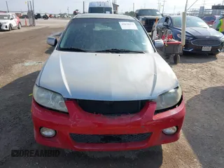 2003 Mazda Protege with VIN JM1BJ245031218333, listed as a IAAI auction lot 42070471 with 181,748 mi miles and . Bid and sale history available at DreamBid. Image 12.