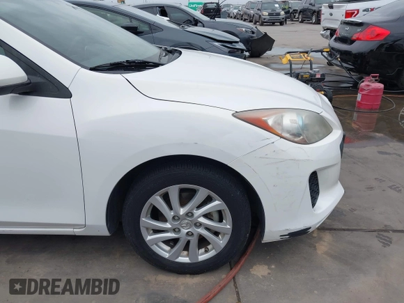 2012 Mazda Mazda3 i Touring with VIN JM1BL1V74C1694444, listed as a IAAI auction lot 41879335 with 123,020 mi miles. Bid and sale history available at carsss.com. Image 6.