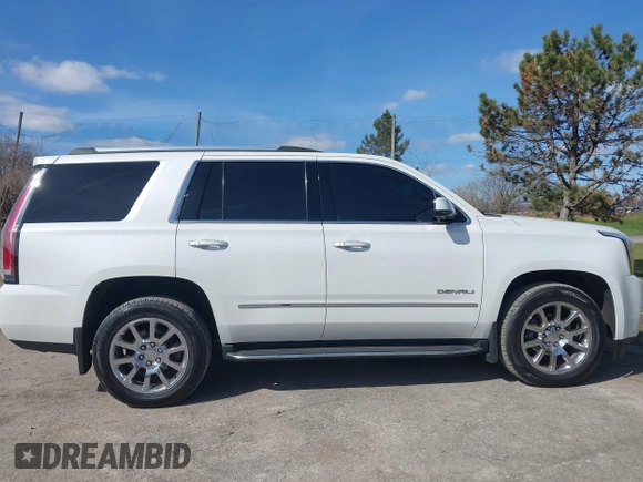 2017 GMC Yukon Denali with VIN 1GKS2CKJ4HR148397, listed as a IAAI auction lot 41942659 with 167,719 mi miles. Bid and sale history available at carsss.com. Image 13.