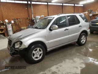 2000 Mercedes-Benz M-Class with VIN 4JGAB54E4YA189786, listed as a Copart auction lot 43583365 with 124,259 mi miles and Salvage Title. Bid and sale history available at carsss.com. Image 1.