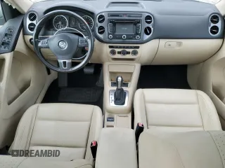 2013 Volkswagen Tiguan SE z VIN WVGBV7AX0DW539618, wystawiony jako Copart lot #71529804 z przebiegiem 148 362 mil mil oraz Szkoda całkowita • Salvage title. Historia ofert i sprzedaży dostępna na DreamBid. Obrazek 8.
