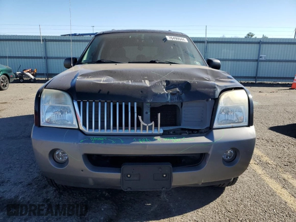 2003 Mercury Mountaineer Convenience z VIN 4M2DU86W23UJ10359, wystawiony jako Copart lot #76490044 z przebiegiem 165 258 mil mil oraz Szkoda całkowita • Salvage title. Historia ofert i sprzedaży dostępna na DreamBid. Obrazek 5.