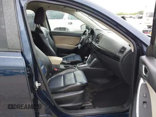 2015 Mazda CX-5 Touring with VIN JM3KE2CY5F0449195, listed as a IAAI auction lot 41894567 with 124,694 mi miles and . Bid and sale history available at DreamBid. Image 5.
