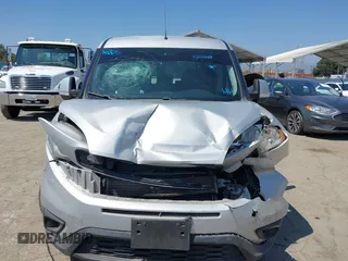 2021 Ram ProMaster City Cargo Tradesman SLT with VIN ZFBHRFBB6M6T38499, listed as a IAAI auction lot 42190007 with 73,186 mi miles. Bid and sale history available at carsss.com. Image 12.