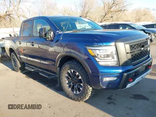 2021 Nissan Titan Pro-4X with VIN 1N6AA1ED1MN517476, listed as a IAAI auction lot 41422217 with 62,650 mi miles and . Bid and sale history available at DreamBid. Image 1.