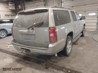 2007 Chevrolet Suburban LT with VIN 1GNFK16357J355897, listed as a IAAI auction lot 41433635 with 265,719 mi miles. Bid and sale history available at carsss.com. Image 4.
