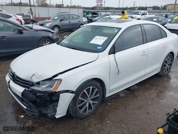 2018 Volkswagen Jetta 1.4T SE with VIN 3VWDB7AJ1JM221517, listed as a IAAI auction lot 41329474 with 87,450 mi miles. Bid and sale history available at carsss.com. Image 2.