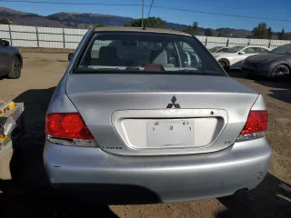 2006 Mitsubishi Lancer ES with VIN JA3AJ26E06U059761, listed as a Copart auction lot 87555905 with 163,073 mi miles and Salvage Title. Bid and sale history available at carsss.com. Image 6.