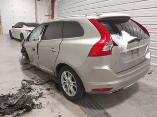 2015 Volvo XC60 T5 Drive-E Premier Plus with VIN YV440MDC6F2616258, listed as a IAAI auction lot 41530303 with 129,950 mi miles. Bid and sale history available at carsss.com. Image 3.