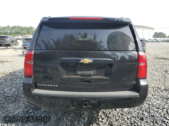 2015 Chevrolet Suburban LT with VIN 1GNSKJKC4FR192292, listed as a Copart auction lot 60434444 with 304,830 mi miles and Salvage Title. Bid and sale history available at DreamBid. Image 6.
