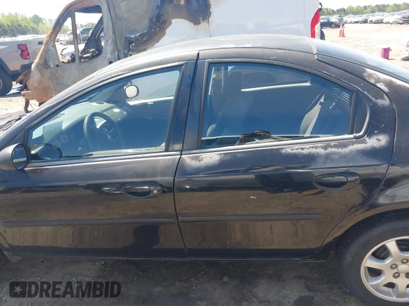 2005 Dodge Neon SXT with VIN 1B3ES56C85D143830, listed as a IAAI auction lot 41990483 with 205,947 mi miles. Bid and sale history available at carsss.com. Image 14.