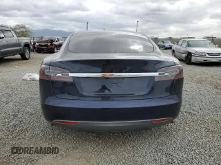 2013 Tesla Model S Performance с VIN 5YJSA1DP9DFP05325, выставлен на аукционе Copart как лот 52617545 с пробегом 122 847 миль миль и Списание • Salvage title. История ставок и продаж доступна на DreamBid. Изображение 6.