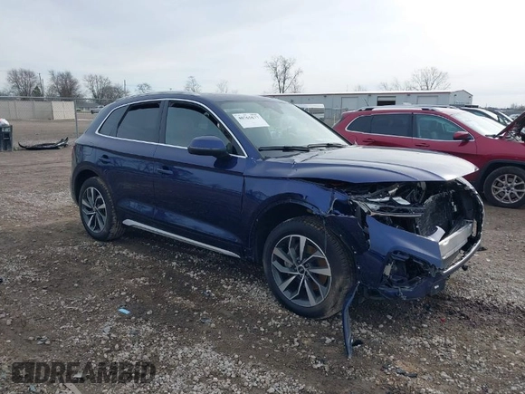 2021 Audi Q5 Premium Plus with VIN WA1BAAFY4M2051403, listed as a IAAI auction lot 40765677 with 30,496 mi miles. Bid and sale history available at carsss.com. Image 1.