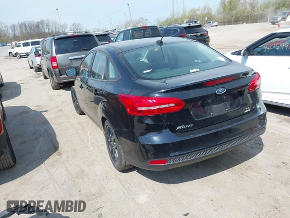 2016 Ford Focus SE with VIN 1FADP3FE6GL335943, listed as a IAAI auction lot 42060995 with 115,701 mi miles. Bid and sale history available at carsss.com. Image 3.