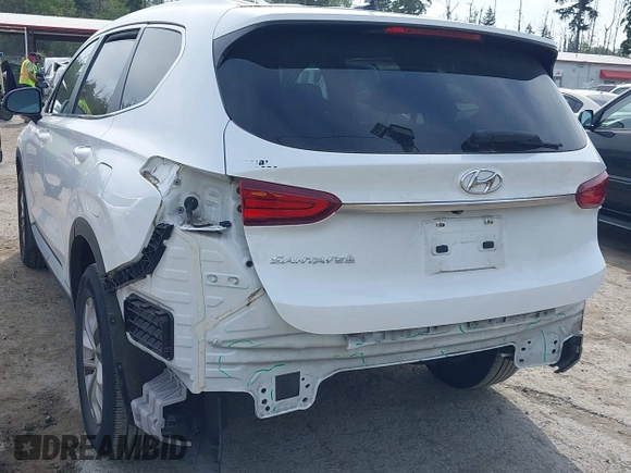 2020 Hyundai Santa Fe SE with VIN 5NMS23AD1LH192085, listed as a IAAI auction lot 42455451 with 50,517 mi miles and . Bid and sale history available at DreamBid. Image 6.