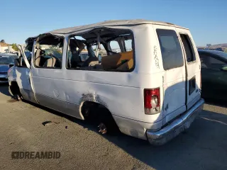 2001 Ford Econoline Passenger XL with VIN 1FMRE11LX1HA66495, listed as a Copart auction lot 70438864 with 306,671 mi miles and Salvage Title. Bid and sale history available at carsss.com. Image 2.