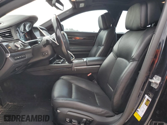 2013 BMW 7 Series 750i with VIN WBAYA8C56DC996704, listed as a Copart auction lot 64466705 with 102,278 mi miles and Salvage title. Bid and sale history available at DreamBid. Image 7.