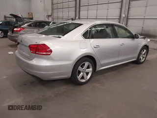 2013 Volkswagen Passat SE with VIN 1VWBH7A39DC145297, listed as a IAAI auction lot 42048991 with 146,897 mi miles and . Bid and sale history available at DreamBid. Image 4.