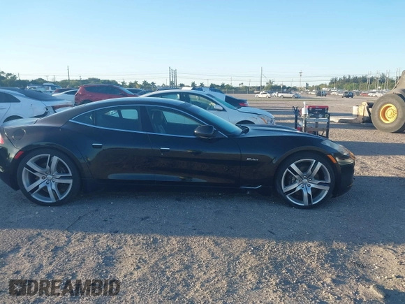 2012 Fisker Karma EcoSport z VIN YH4K14AA0CA000444, wystawiony jako IAAI lot #41749223 z przebiegiem 69 793 mil mil oraz . Historia ofert i sprzedaży dostępna na DreamBid. Obrazek 13.
