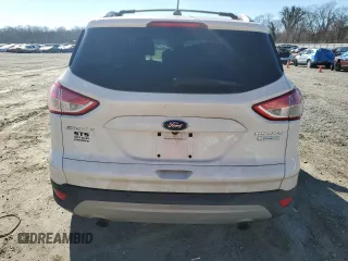 2013 Ford Escape Titanium с VIN 1FMCU0J96DUD67980, выставлен на аукционе Copart как лот 87187974 с пробегом 107 284 миль миль и Списание • Salvage title. История ставок и продаж доступна на DreamBid. Изображение 6.