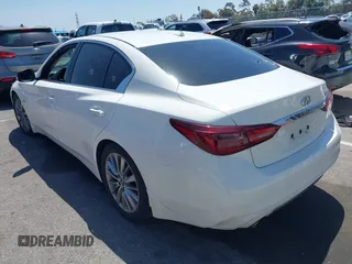 2019 Infiniti Q50 Luxe z VIN JN1EV7AP7KM518276, wystawiony jako IAAI lot #42148033 z przebiegiem 56 720 mil mil oraz . Historia ofert i sprzedaży dostępna na DreamBid. Obrazek 3.