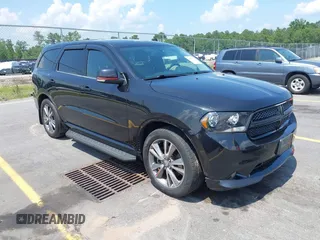 2013 Dodge Durango R/T z VIN 1C4SDHCT5DC559078, wystawiony jako IAAI lot #42453181 z przebiegiem 226 637 mil mil oraz . Historia ofert i sprzedaży dostępna na DreamBid. Obrazek 1.