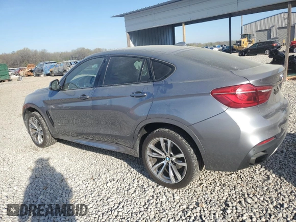 2016 BMW X6 xDrive50i z VIN 5UXKU6C57G0R33958, wystawiony jako Copart lot #49774065 z przebiegiem 124 226 mil mil oraz Szkoda całkowita • Salvage title. Historia ofert i sprzedaży dostępna na DreamBid. Obrazek 2.