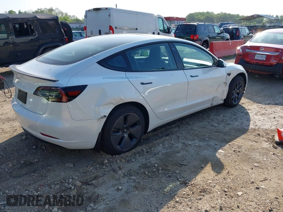 2023 Tesla Model 3 with VIN 5YJ3E1EA3PF617460, listed as a IAAI auction lot 42154401 with 9,578 mi miles and . Bid and sale history available at DreamBid. Image 4.