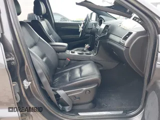 2021 Jeep Grand Cherokee 80th Anniversary with VIN 1C4RJFBG0MC504148, listed as a IAAI auction lot 42063979 with 77,941 mi miles and . Bid and sale history available at DreamBid. Image 5.