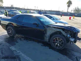 2016 Dodge Challenger SXT with VIN 2C3CDZAG0GH195092, listed as a IAAI auction lot 41423493 with 103,260 mi miles. Bid and sale history available at carsss.com. Image 1.