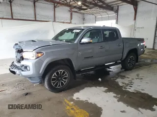 2021 Toyota Tacoma SR z VIN 5TFCZ5AN1MX282270, wystawiony jako Copart lot #58480775 z przebiegiem 80 584 mil mil oraz Szkoda całkowita • Salvage title. Historia ofert i sprzedaży dostępna na DreamBid. Obrazek 1.