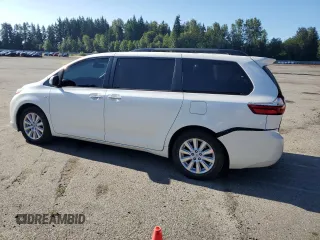 2017 Toyota Sienna XLE with VIN 5TDDZ3DC0HS164600, listed as a Copart auction lot 64262685 with 82,353 mi miles and Salvage title. Bid and sale history available at DreamBid. Image 2.