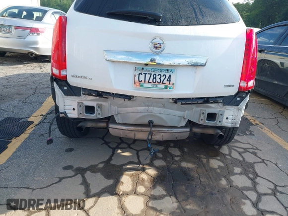 2013 Cadillac SRX Premium Collection with VIN 3GYFNJE33DS625036, listed as a IAAI auction lot 42464711 with 83,344 mi miles and . Bid and sale history available at DreamBid. Image 6.