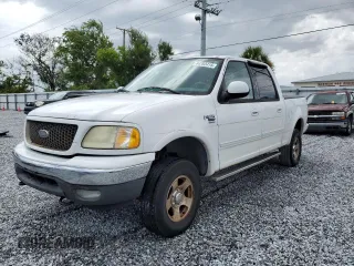 2003 Ford F-150 XLT with VIN 1FTRW08L83KA30568, listed as a Copart auction lot 64782415 with 212,184 mi miles and Clean title. Bid and sale history available at DreamBid. Image 1.