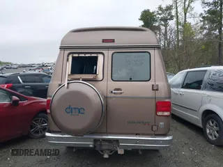 1995 Chevrolet Chevy Van z VIN 1GBEG25K8SF245639, wystawiony jako IAAI lot #41917862 z przebiegiem 89 015 mil mil oraz . Historia ofert i sprzedaży dostępna na DreamBid. Obrazek 16.