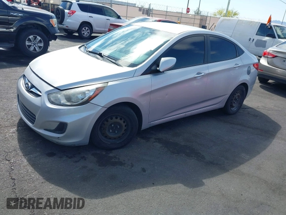 2014 Hyundai Accent GLS with VIN KMHCT4AE9EU688954, listed as a IAAI auction lot 42141664 with 99,041 mi miles. Bid and sale history available at carsss.com. Image 2.