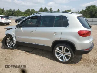 2013 Volkswagen Tiguan S with VIN WVGAV3AX6DW588083, listed as a Copart auction lot 60114965 with 109,318 mi miles and Salvage title. Bid and sale history available at DreamBid. Image 2.