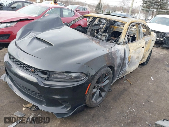 2019 Dodge Charger Scat Pack with VIN 2C3CDXGJ8KH579332, listed as a IAAI auction lot 41482173 with Not Provided miles and . Bid and sale history available at DreamBid. Image 2.