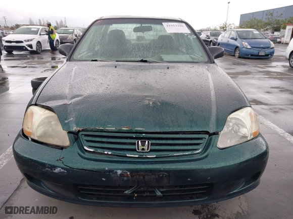 1999 Honda Civic VP with VIN 2HGEJ6618XH579736, listed as a IAAI auction lot 41912296 with 268,631 mi miles. Bid and sale history available at carsss.com. Image 13.