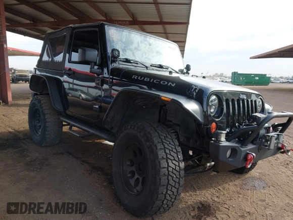 2011 Jeep Wrangler Rubicon with VIN 1J4BA6D13BL545343, listed as a IAAI auction lot 40980056 with 107,207 mi miles and . Bid and sale history available at carsss.com. Image 1.