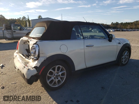 2017 MINI Convertible Cooper с VIN WMWWG5C32H3C20548, выставлен на аукционе Copart как лот 81914854 с пробегом 104 125 миль миль и Списание • Salvage title. История ставок и продаж доступна на DreamBid. Изображение 3.