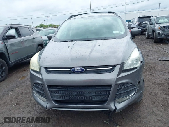 2013 Ford Escape SE with VIN 1FMCU9GX9DUA57901, listed as a IAAI auction lot 42367615 with 140,000 mi miles and . Bid and sale history available at DreamBid. Image 12.